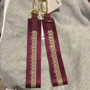 lululemon athletica Burgundy and Gold Never Lost Keychain